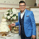 David Tutera at a royal wedding watch party by Michaels (perfect)